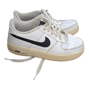 Nike Air Low-Top Sneakers in White with Black Swoosh